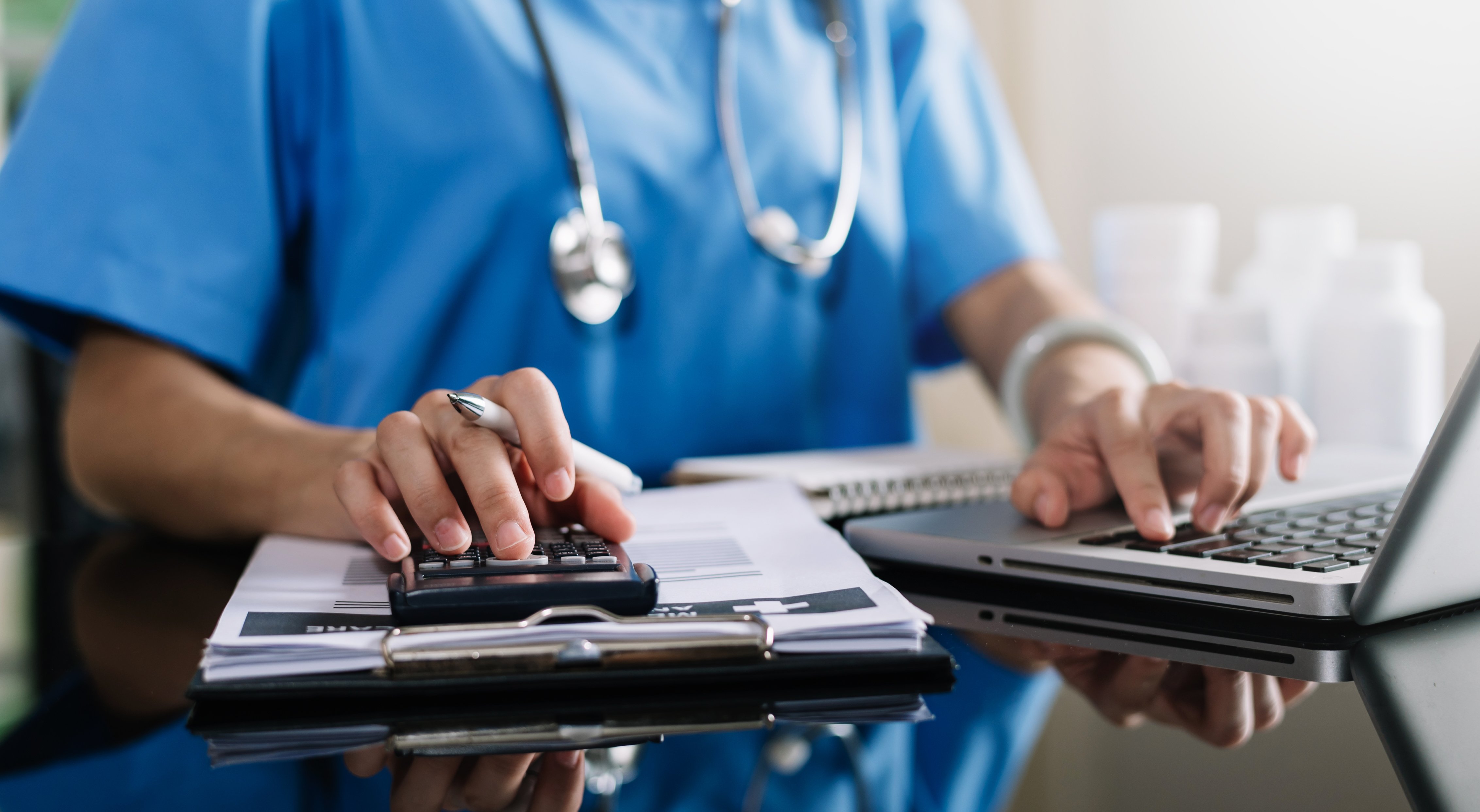 healthcare-costs-and-fees-concept-hand-of-smart-do-2026-01-05-23-24-59-utc