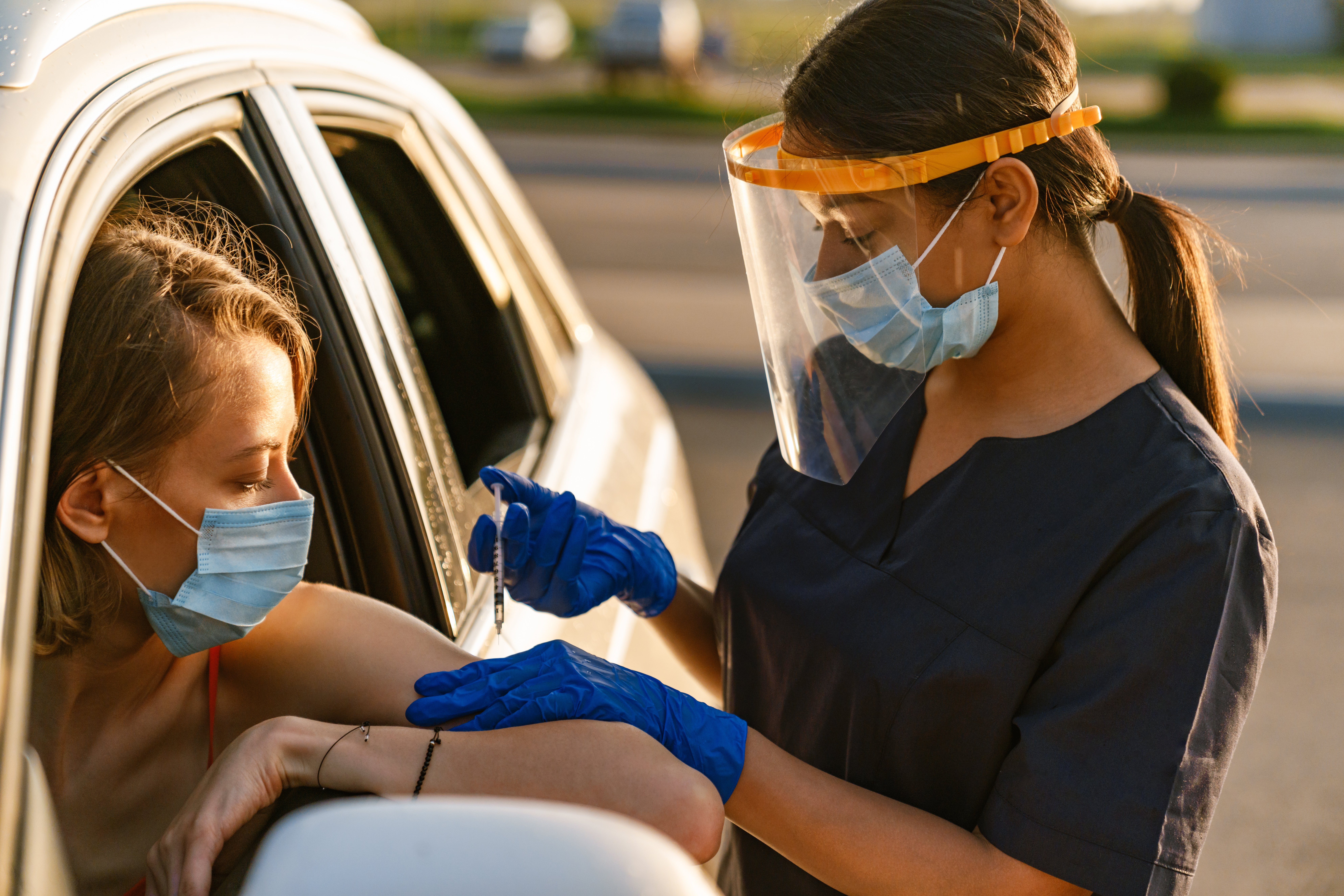 healthcare-worker-giving-injection-to-patient-in-c-2026-03-24-00-36-31-utc