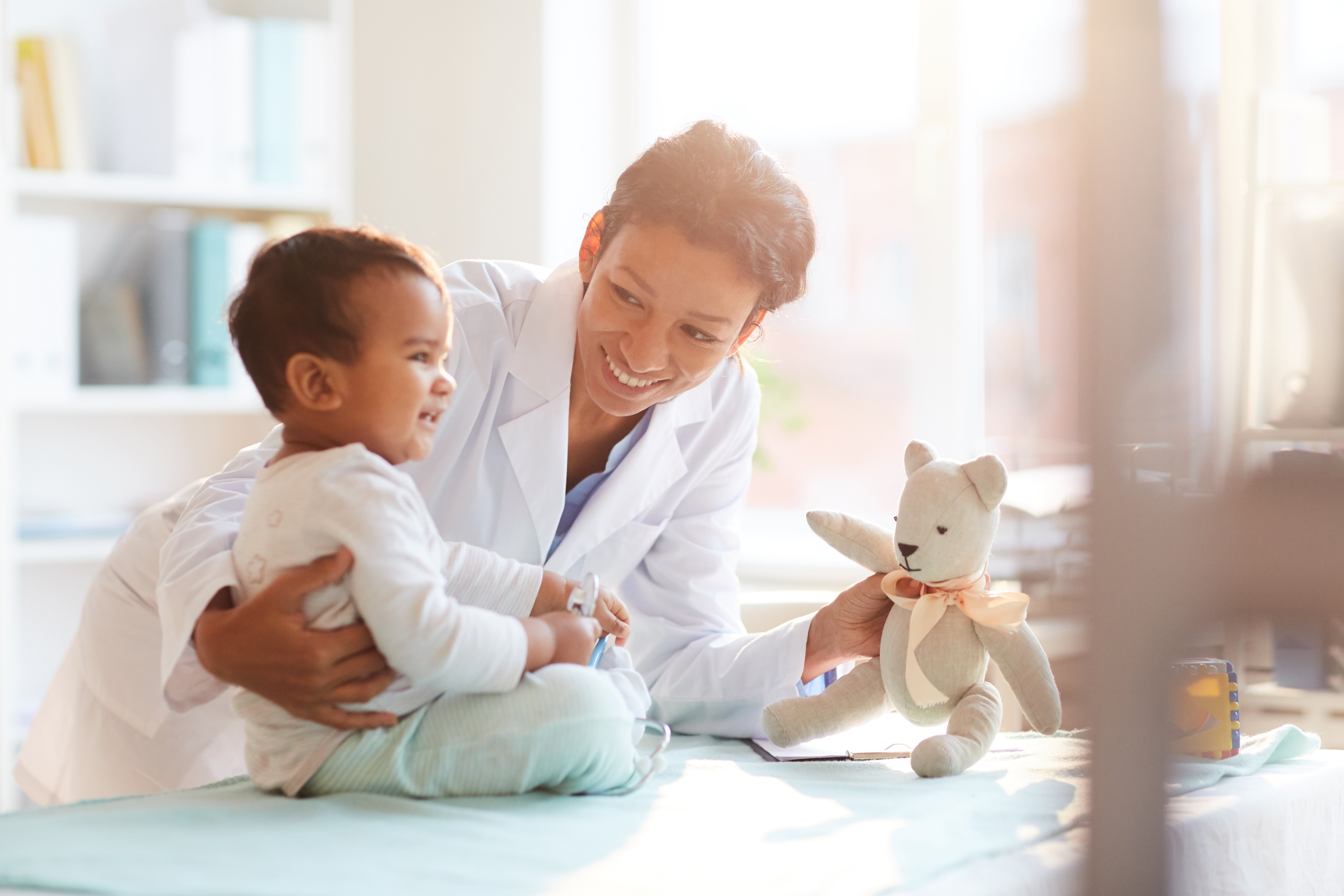 doctor-with-little-patient-at-hospital-2026-03-18-15-56-33-utc